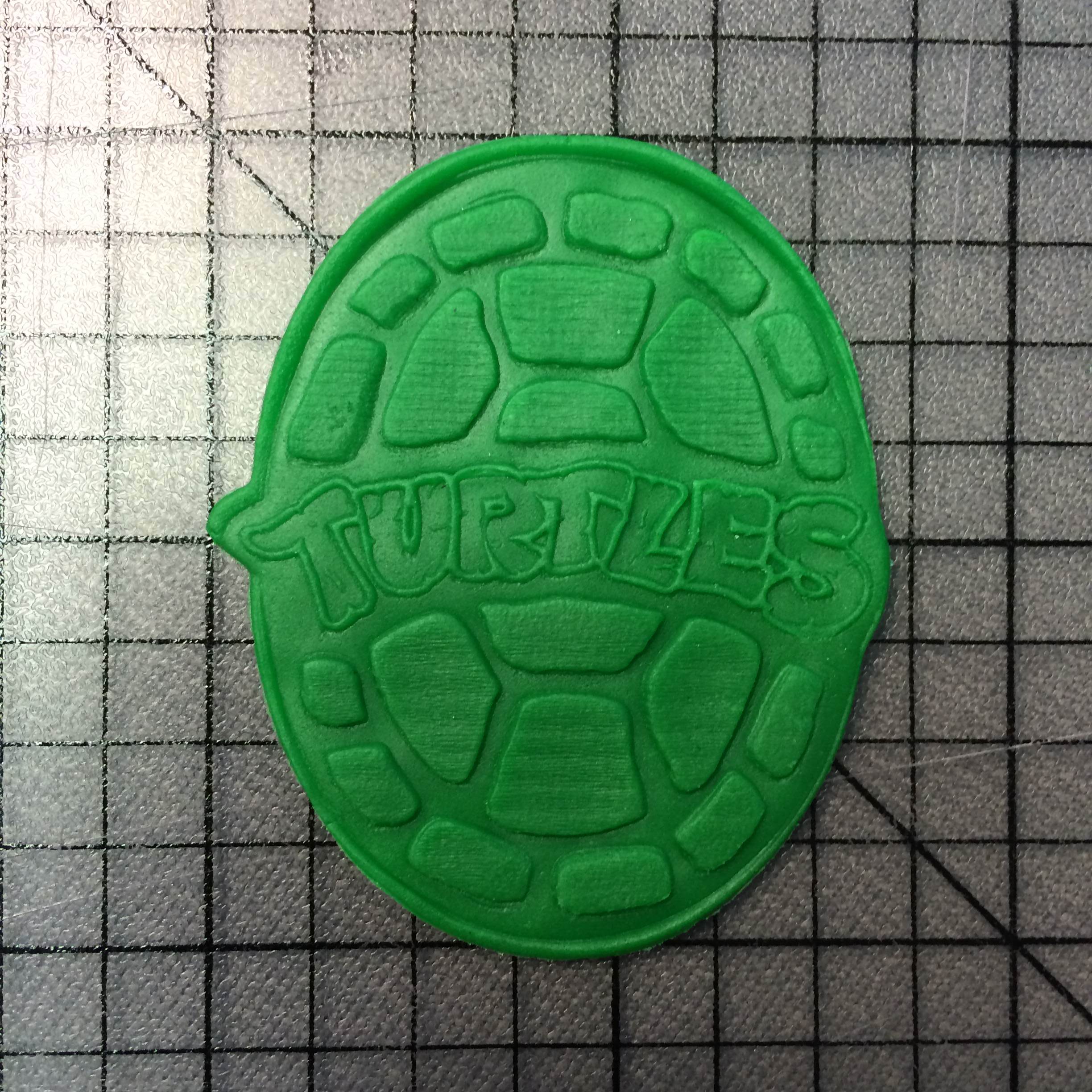 https://www.jbcookiecutters.com/wp-content/uploads/2015/11/TMNT-Turtle-Shell-101-Cookie-Cutter-and-Stamp-2.jpg