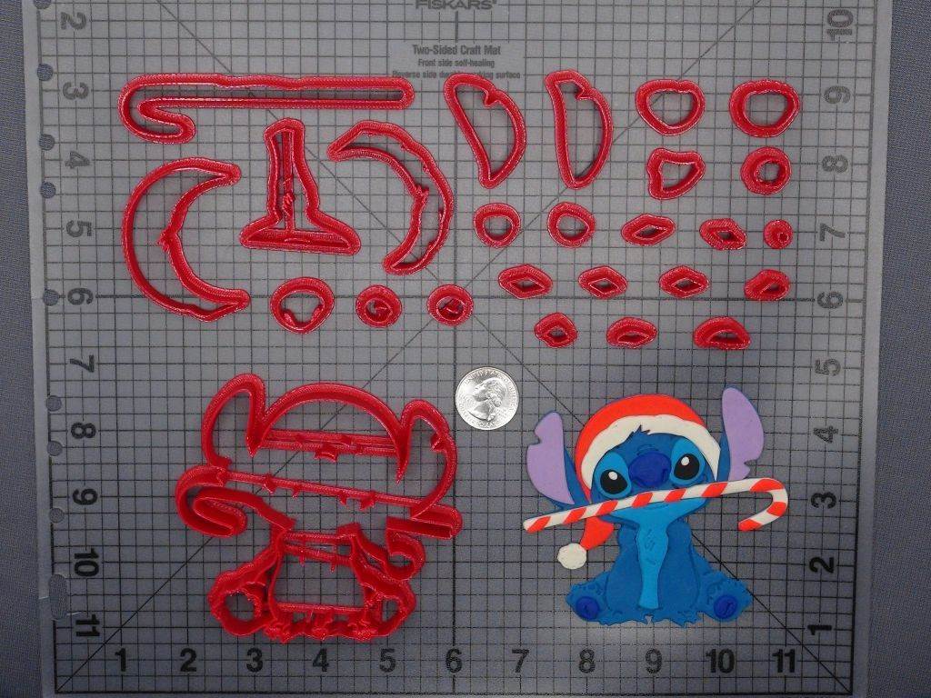 https://www.jbcookiecutters.com/wp-content/uploads/2021/09/JB_Christmas-Lilo-and-Stitch-Stitch-with-Candy-Cane-266-F732-Cookie-Cutter-Set.jpg
